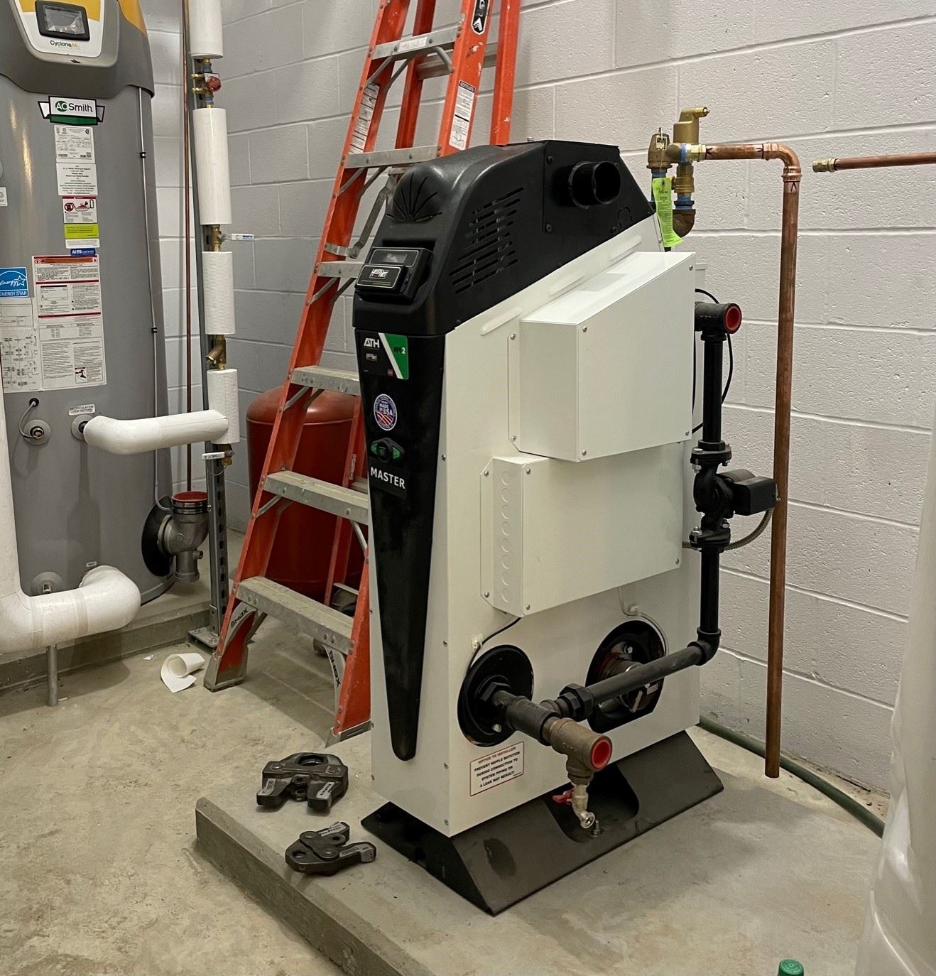 Installation of Boilers in the Mechanical Room at the Main Building